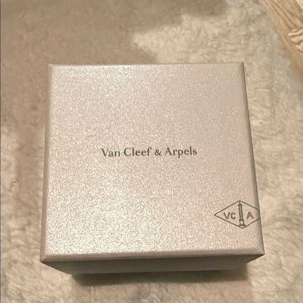 Van Cleef & Arpels Shimmering Silver Gift Box